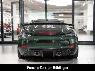 Fahrzeugbild eines Porsche Cayman in grün.