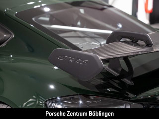 Fahrzeugbild eines Porsche Cayman in grün.