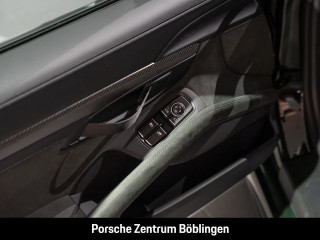 Fahrzeugbild eines Porsche Cayman in grün.