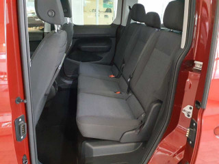Fahrzeugbild eines Volkswagen Caddy in rot.