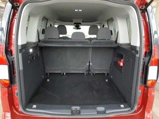 Fahrzeugbild eines Volkswagen Caddy in rot.