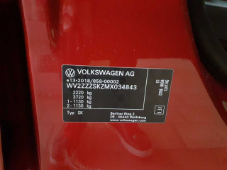 Fahrzeugbild eines Volkswagen Caddy in rot.